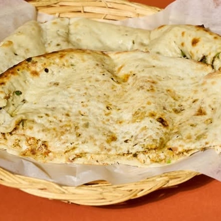Savor our freshly baked naan